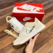 Tenis da nike dourado